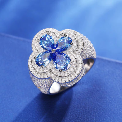 CUBIC ZIRCONIA BLUE LUCKY CLOVER RING. - WHITE GOLD